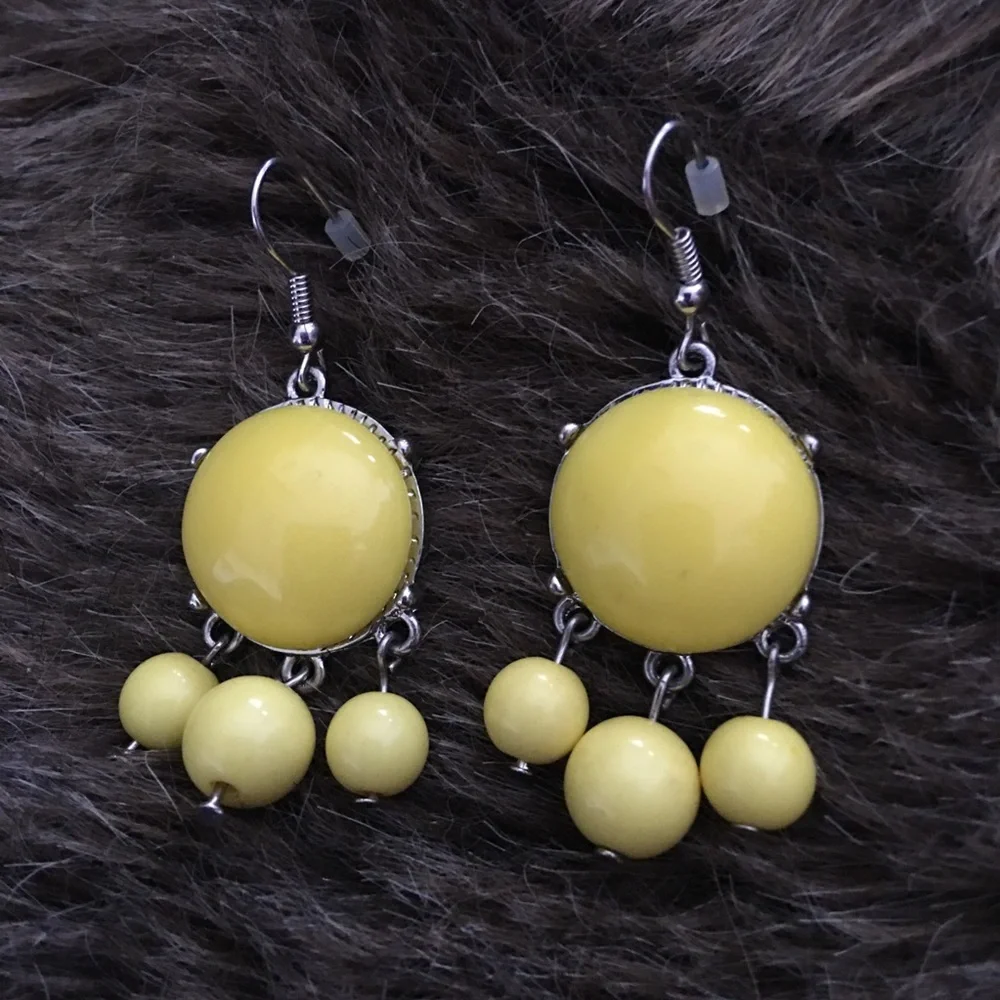 Yellow dangle bead fish hook earrings